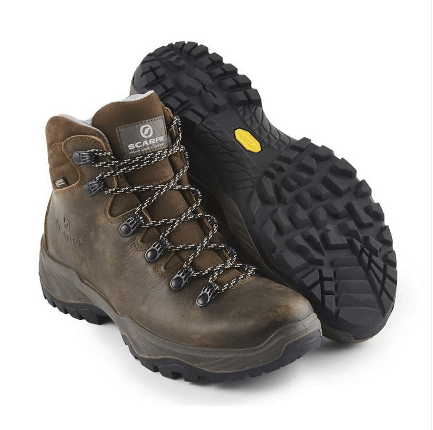 A pair of high-quality hiking boots with prominent treads and lacing systems, displayed on a white background.