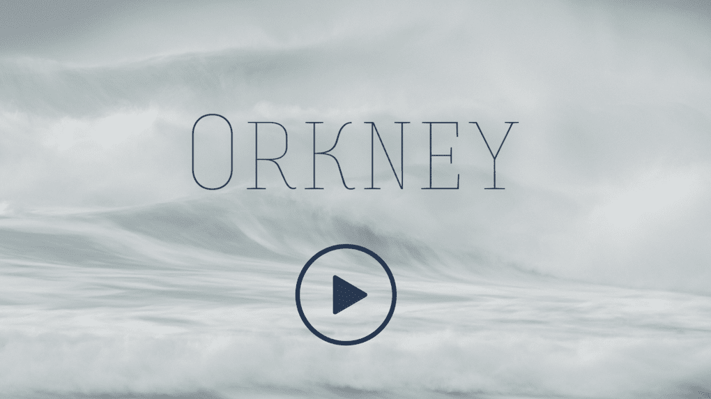 A monochrome image featuring the word "ORKNEY" with a play button icon, set against a backdrop of cresting waves.