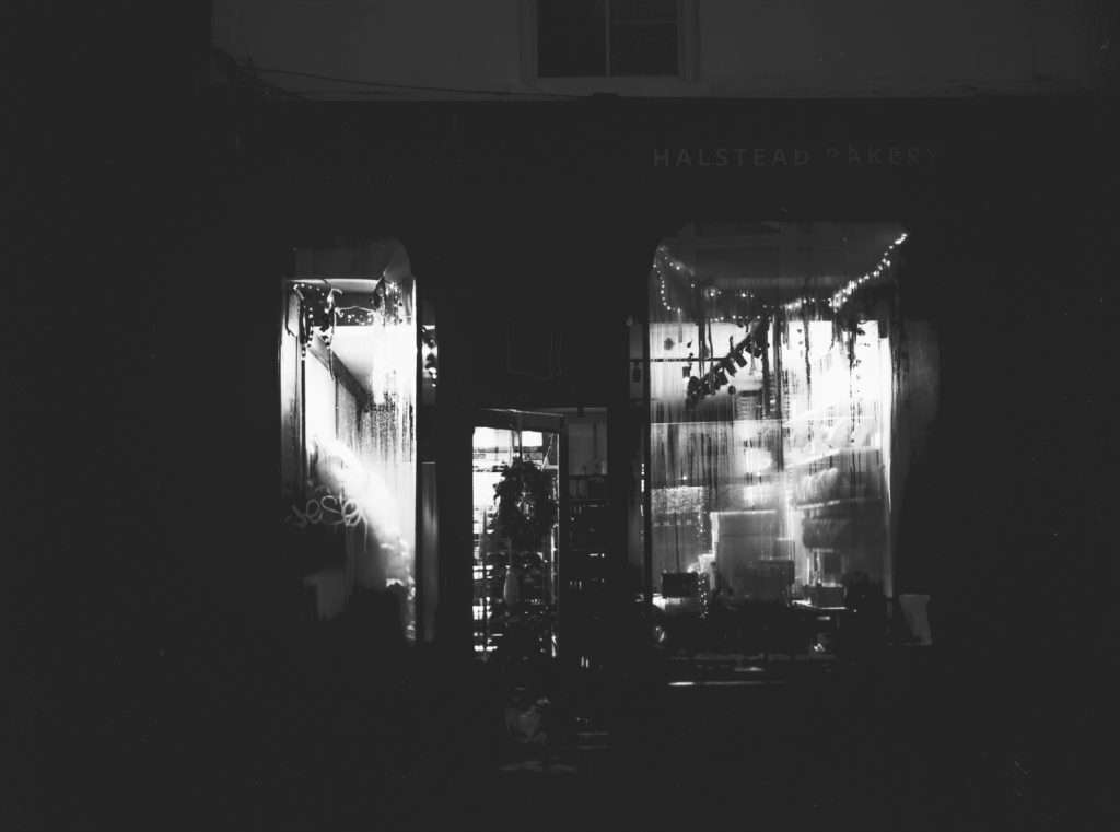 Halstead Bakery in black and white early morning backlit